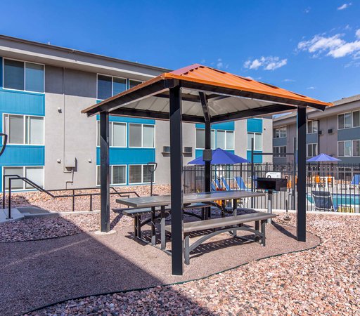 Pergolas and outdoor seating area at the Aero Place Apartments, located in Colorado Springs, CO.